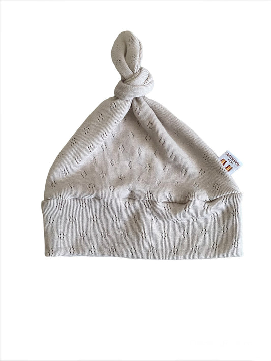 Knoopmutsje Ajour Little Adventure in beige